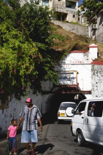 WEST INDIES, Grenada, St Georges, The Sendall Tunnel built in 1894 with pedestrians and cars moving