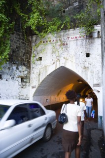 WEST INDIES, Grenada, St Georges, The Sendall Tunnel built in 1894 with pedestrians and cars moving