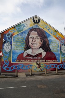 IRELAND, North, Belfast, "Falls Road, Mural of Bobby Sands on the gable end of the Sinn Fein