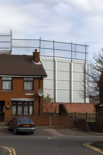 IRELAND, North, Belfast, "West, Falls Road, Peace Line barrier between the Catholic Lower Falls and