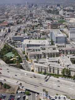 USA, California, Los Angeles, Freeway & views across west LA . Smog