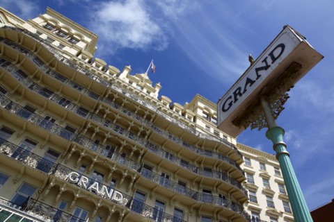 ENGLAND, East Sussex, Brighton, Exterior of the Grand Hotel on the Kings Road seafront.