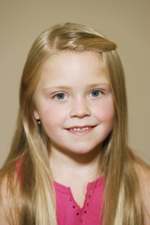 PEOPLE, Children, Girls, Portrait of 7 year old girl smiling.