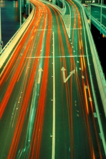 TRANSPORT, Road, Cars, Red and yellow blurred light trails from night time traffic.