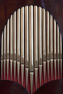 ENGLAND, West Sussex, Chichester, "Cathedral Interior, detail of minature organ showing the pipes."