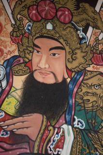 THAILAND, North, Chiang Mai, Pung Tao Gong Ancestral Temple. Close up of a colourful mural