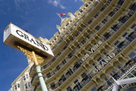 ENGLAND, East Sussex, Brighton, The De Vere Grand Hotel entrance and facade of rooms with balconies