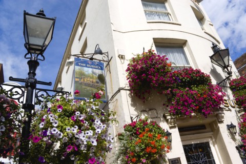 ENGLAND, East Sussex, Brighton, The Lanes Old fashioned streetlight lamppost outside The Sussex Pub