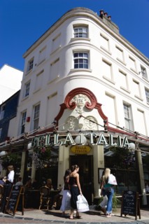 ENGLAND, East Sussex, Brighton, The Lanes Bella Italia Italian restaurant with diners at tables on