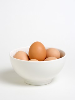 FOOD, Uncooked, Eggs, Free range eggs in a bowl on a white background.