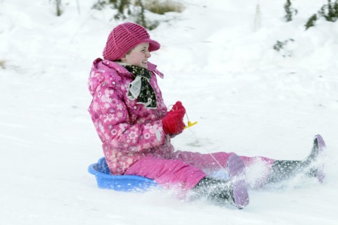 WEATHER, Winter, Snow, "Young girl sledding down hill. Perth, Scotland. "
