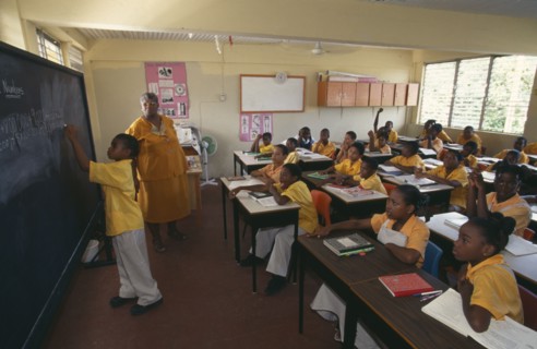 ST LUCIA  Castries Children and teacher in classroom at Carmen Rene Memorial school.Windward