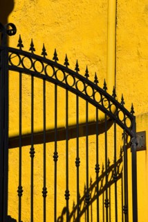IRELAND, COunty Galway, Connemara, Clifden, Colourful gate and wall.