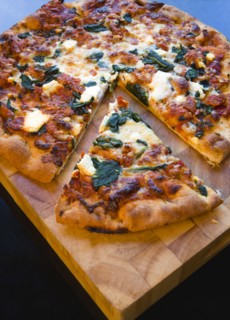 Food, Cooked, Pizza, Italian spinach and ricotta cheese pizza on wooden cutting board with a slice