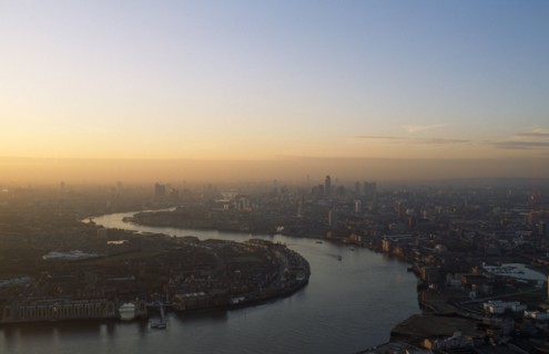 England, London, Canary Wharf, View over the City of London from Canada Tower in a  haze of smog at