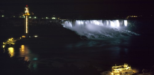 Canada, Ontario, Niagara Falls, American falls illuminted at night.