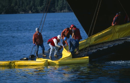 USA, Alaska, Cordova, Oil Spill prctice drill, deploying and retrieving containment booms.