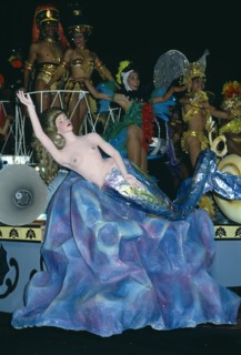 Cuba, Matanzas, Varadero, Carnival float decorated with a papier mache mermaid with people in