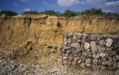 ENGLAND, West Sussex, West Wittering, Rebuilding sea defence to prevent further erosion along south