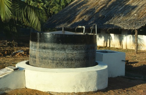 India, Biogas Digester producing methane gas from cattle manure.