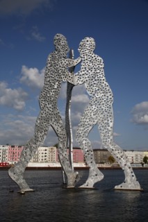 Germany, Berlin, Detail of Molecule Men sculpture 30 metres in height by Jonathan Borofsky on River