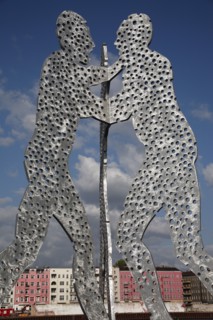 Germany, Berlin, Molecule Men sculpture 30 metres in height by Jonathan Borofsky on River Spree.