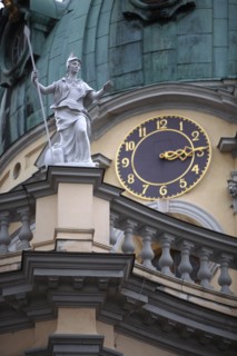 Germany, BErlin, Charlottenburg Palace, Statue & clock face on dome.