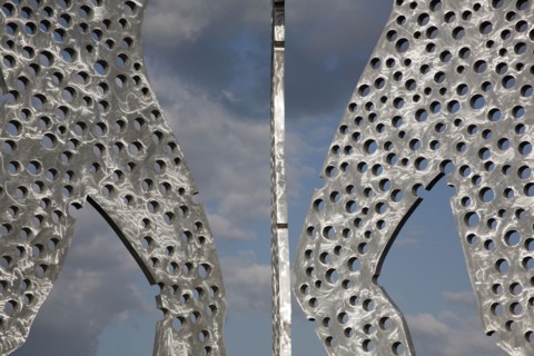 Germany, Berlin, Detail of Molecule Men sculpture 30 metres in height by Jonathan Borofsky on River