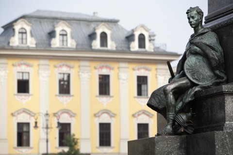 Poland, Krakow, Detail of male figure on monument to the polish romantic poet Adam Mickiewicz by