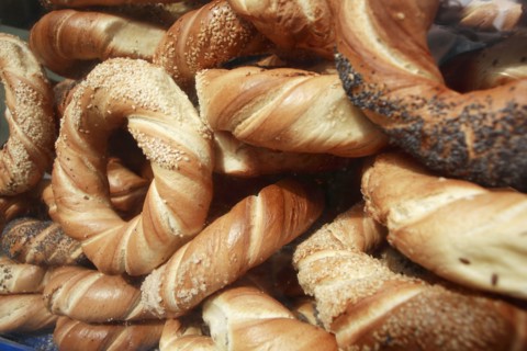 Poland, Krakow, Obwarzaneck, twisted rings of bread strewn with poppy sale, for sale from street