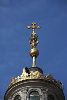 Poland, Krakow, Crucifix on dome of Wawel Cathedral.