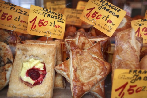 Poland, Krakow, display of cakes and pastries in Stary Kleparz market.