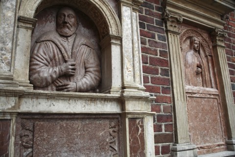 Poland, Krakow, bas reliefs of Georgius Laubacensis & Anna Petri on the outside of St Barbara's