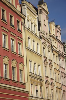 Poland, Wroclaw, pastel coloured building facades in the Rynek old town square.