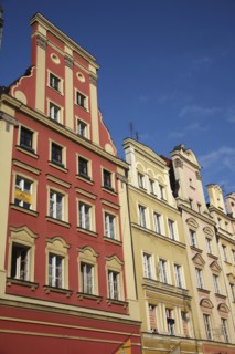 Poland, Wroclaw, pastel coloured building facades in the Rynek old town square.