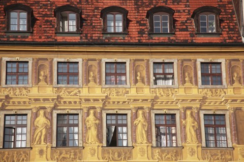 Poland, Wroclaw, detail of building facade with tromp l'oiel painted mural in the Rynek old town