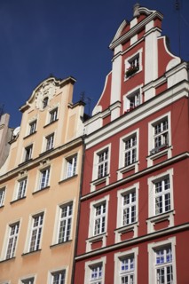 Poland, Wroclaw, pastel coloured building facades in the Rynek old town square.