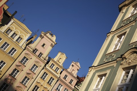 Poland, Wroclaw, pastel coloured building facades in the Rynek old town square.