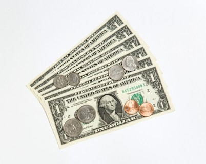Business, Finance, Money, US Currency Paper one dollar banknote and coins of one cent penny five