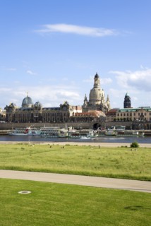 GERMANY, Saxony, Dresden, The city skyline with cruise boats moored on the River Elbe in front of