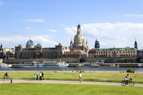 GERMANY, Saxony, Dresden, The city skyline with cruise boats moored on the River Elbe in front of