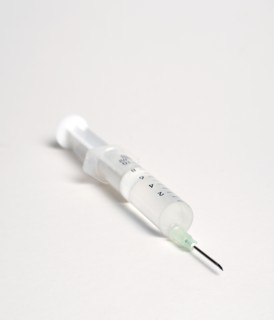 Health, Medicine, Medical Instruments, Hypodermic syringe with needle on a white background.
