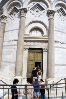 ITALY, Tuscany, Pisa, The Campo dei Miracoli or Field of Miracles with a tour party of tourists at