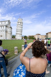 ITALY, Tuscany, Pisa, The Campo dei Miracoli or Field of Miracles.Tourists taking photopraphs of