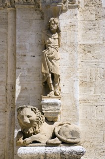 ITALY, Tuscany, San Quirico D'Orcia, One of the caryatid or zoomorphic columns of the portale di