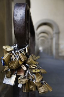 ITALY, Tuscany, Florence, Bunches of locked padlocks used by stallholders in the Vasari Corridor