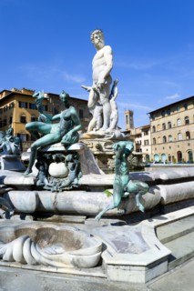 ITALY, Tuscany, Florence, The 1575 Mannerist Neptune fountain with the Roman sea God surrounded by