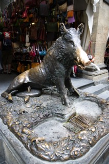 ITALY, Tuscany, Florence, The 17th century bronze fountain called Il Porcellino in the Mercato