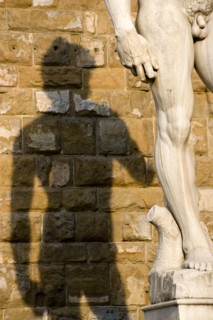 ITALY, Tuscany, Florence, Shadow of the replica Rennaisance statue of David by Michelangelo on the