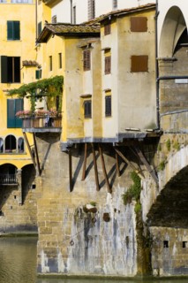 ITALY Tuscany Florence Ponte Vecchio medieval bridge across River Arno. View of merchant's shops